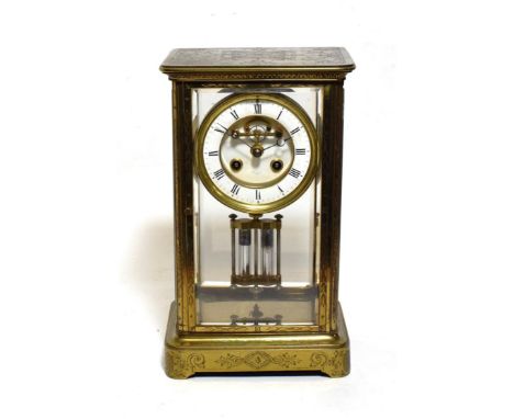 A Brass Engraved Four Glass Striking Mantel Clock, signed Hry Marc, circa 1890, case with elaborate engraved floral and scrol