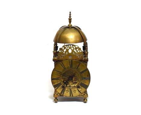 A Brass Striking Lantern Clock, four posted frame, pierced frets, frets inscribed ''Tho Wheeler near French Church'' side doo