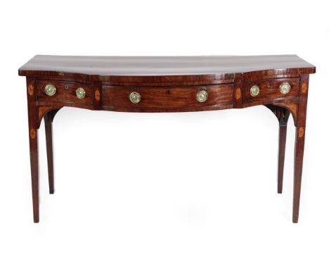 A Late George III Mahogany and Marquetry Inlaid Serving Table, late 18th century, of serpentine shaped form, with large bowfr