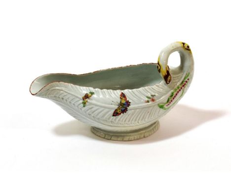 A Worcester Porcelain Cos Lettuce Leaf Sauceboat, circa 1755, naturalistically modelled and painted with insects and flower s
