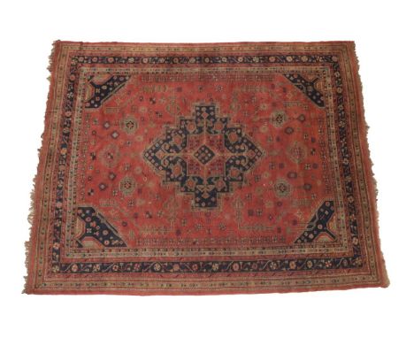 Ushak Carpet Central/West Anatolia, circa 1920 The soft brick field of angular motifs around a stepped medallion framed by in