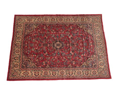 Good Saroukh Mahal Carpet West Iran, circa 1960 The blood red field of floral sprays around an indigo medallion  framed by sp