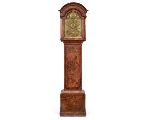 ~ A Walnut Longcase Clock, arched pediment, trunk and base with well figured veneers and crossbanding, later 15-inch arch bra