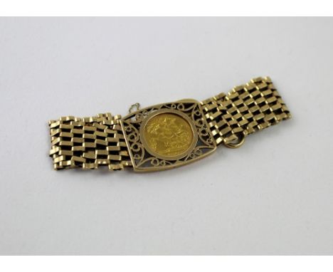A George V half sovereign, 1913, in a 9ct gold six bar gate bracelet with heart clasp, approx 23.8g. CONDITION REPORT 375 sta