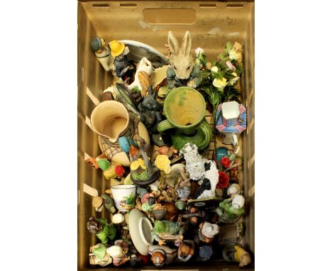 A collection of mixed modern ceramic and resin figures to include Goebel figurines.