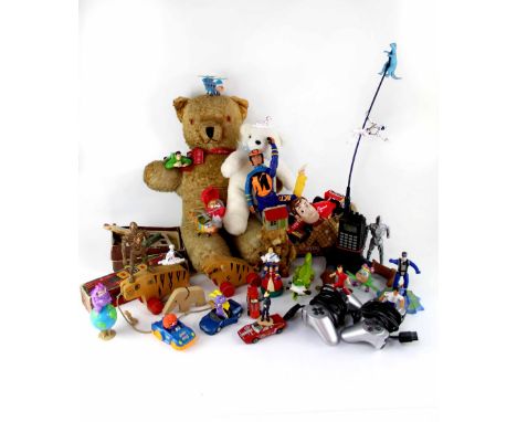 A quantity of toys and games to include dominoes, Action Man, a 'Who Wants to be a Millionaire?' boardgame, also two stuffed 