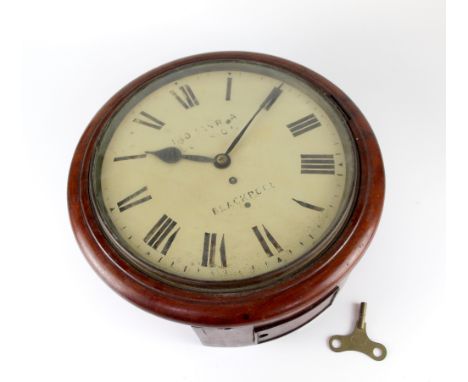 A mahogany-cased circular wall clock, the white enamel dial set with Roman numerals and inscribed 'Thomas RA South Shore, Bla