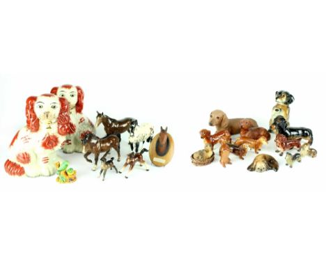 A boxed Beswick Appaloosa speckled horse, two further brown Beswick horses (both af), a Beswick foal and a Beswick Red Rum bu