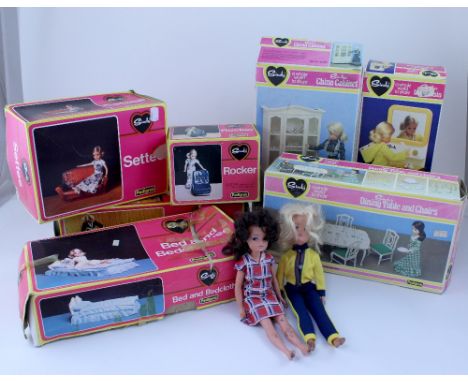 Sindy doll items comprising boxed china cabinet, dining table and chairs, wash basin, bed and bed clothes, bath, rocker, sett