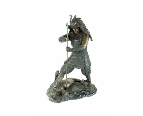 A large 20th century Japanese bronze figure group depicting Samurai with spear stood victoriously over a tiger, indistinct im