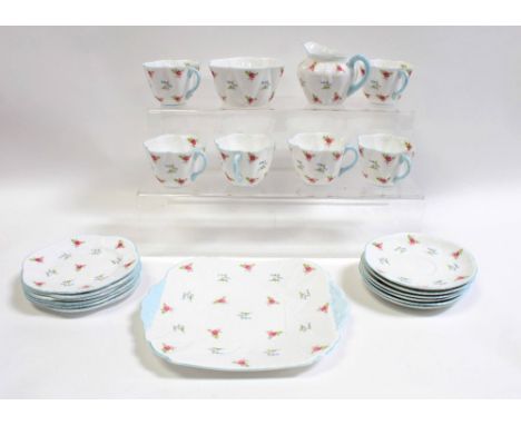 A Shelley bone china part tea service, pattern no.2303, 'Roses and Bluebells' on dainty body, comprising six cups, six saucer