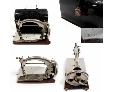 A Salters 'Ideal' portable chain stitch sewing machine, hand cranked in black tin carry case, early 20th century, height 15cm