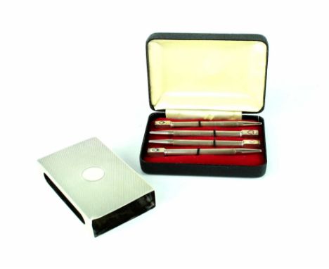 A boxed set of four George V hallmarked silver bridge pencils with engine-turned decoration and card suit finials, William H 