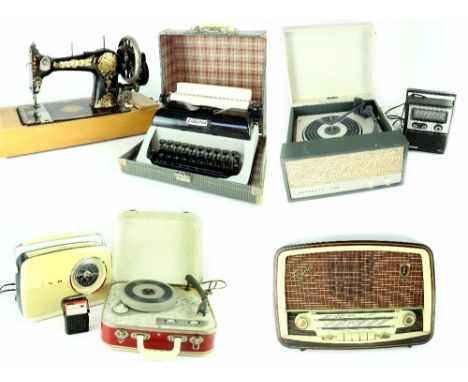 A cased Dansette Viva record player, a similar smaller Alba example, a Jones' sewing machine, serial no.141188, a cased Lilli