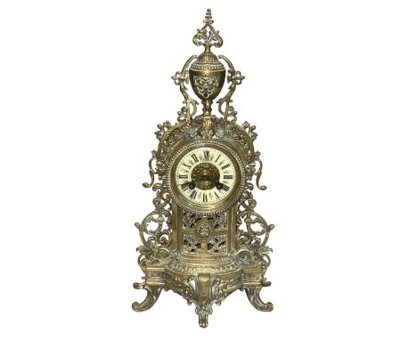 Ornate brass mantel clock, marked 'Tabey', 44cm high.