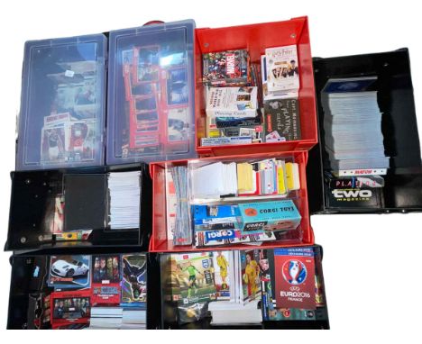 Collection of assorted trade cards including football, Star Wars, playing cards including 007 and Marvel, postcards, etc.