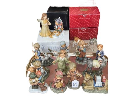 Eleven Berta Hummel figures, Goebel musical figure Ride into Christmas, Calf and Donkey.