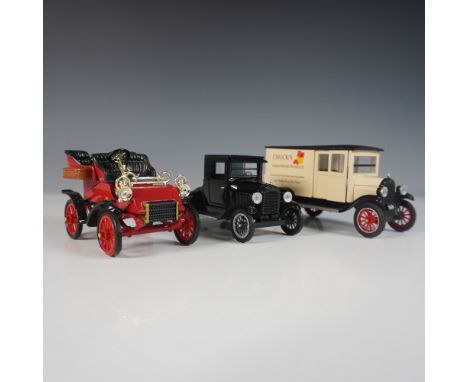 A set of three vintage diecast model cars featuring classic early 20th-century automobiles. The set includes a 1903 Ford Mode