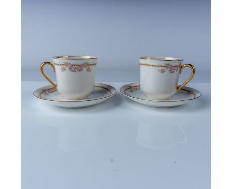 A charming 2-piece demitasse cup and saucer set by Pope-Gosser China, produced between 1920 and 1931. The set features a deli