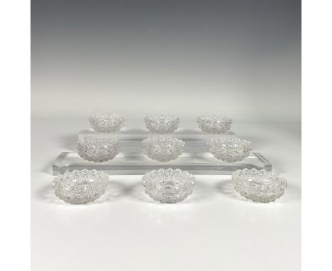 Clear glass mini serving bowls with intricate lacy daisy patterns, expertly cut into the glass.Dimensions: 2.25"W x 1"HCondit