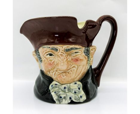 Brown hat, dark green coat, blue polka-dot bow tie. Royal Doulton backstamp.Artist: Charles J. NokeIssued: 1934 - 1983Dimensi