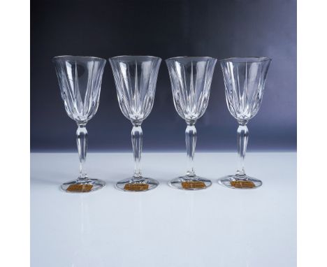 This beautiful set of four full lead crystal silver rimmed wine glasses is crafted by Noritake in Germany. Each glass feature