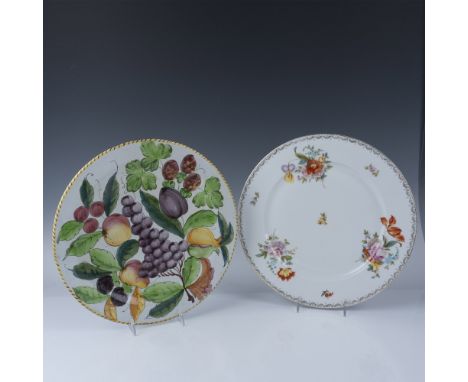 A set of two hand-painted decorative plates, featuring a Tirschenreuth Old Meissen Bavarian plate with an elegant floral desi