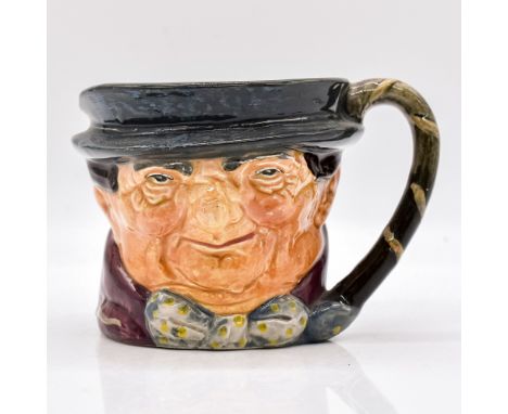 Dark grey hat; maroon coat; grey-white bow with yellow spots. Series: Charles Dickens' Characters. Royal Doulton backstamp.Ar