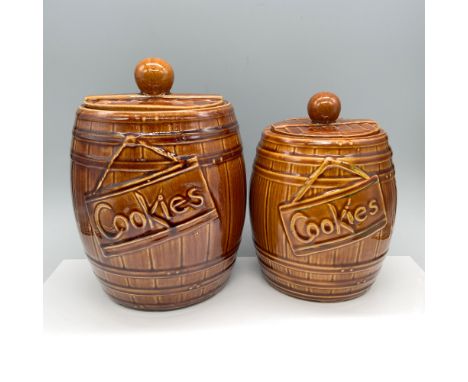 Excellent light brown glossy container themed as a whiskey barrel and used to store cookies. Largest item measures 10"H x 7" 