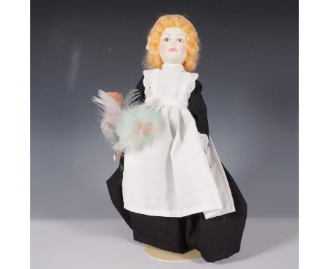 Royal Doulton Nisbet collectors doll, Saturdays Girl, crafted with a porcelain head, hands, and feet, dressed in a traditiona