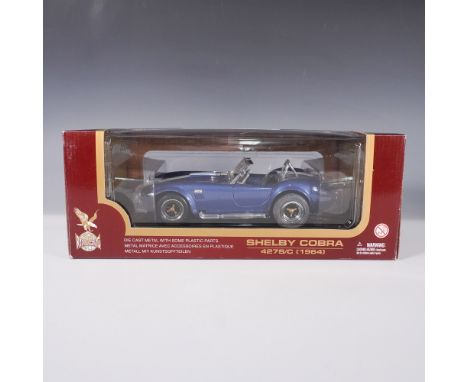 Detailed die-cast model of the iconic Shelby Cobra 427S/C from 1964, produced by Road Legends. This finely crafted collectibl