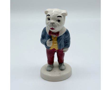 This Algy Pug figurine from Beswick's Rupert and His Friends series, produced in 1981, captures the charm of Rupert Bear's cl