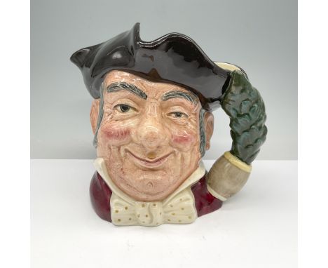This Royal Doulton Character Jug is titled Mine Host (DP6468), crafted in 1957. It features a jovial, welcoming gentleman wit