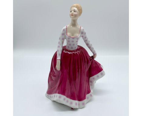 Presenting the Royal Doulton porcelain figurine titled "Fiona," model HN2694, designed by Peggy Davies. Issued between 1974 a
