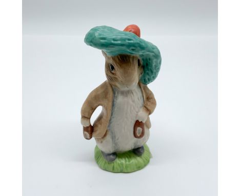 This hand-painted porcelain figurine features Beatrix Potter's Benjamin Bunny, wearing a green hat and holding mittens. Produ