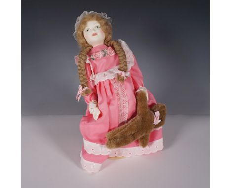 Royal Doulton Nisbet Tuesdays Girl DN4 from the Victorian Birthday Doll Collection. This porcelain doll features finely paint