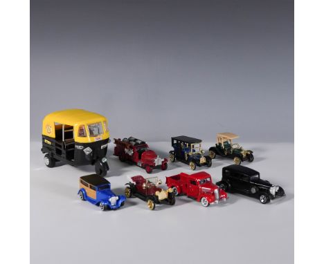 This 8-piece vehicle model set features a mix of diecast and plastic classic cars, fire trucks, and taxis, showcasing diverse