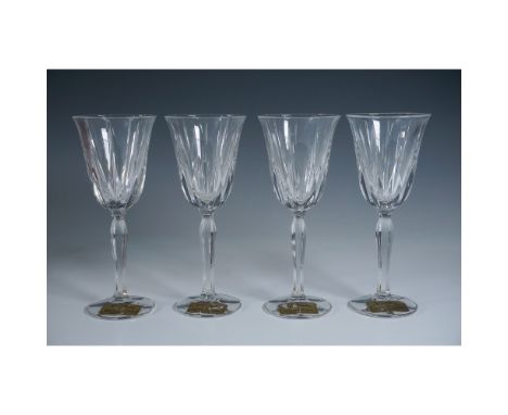 A stunning set of four (4) Noritake Vendome full lead crystal wine glasses, each featuring a classic flared bowl with vertica