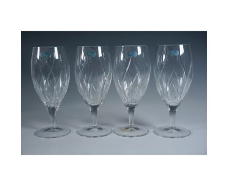 A set of 4 Cristal J.G. Durand ice tea glasses in the Agena pattern, featuring an elegant swirl cut design on the bowl and sm