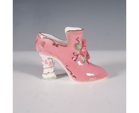 A charming Coalport fine bone china figurine titled Sleeping Beauty, modeled in the shape of an elegant Victorian-style shoe.