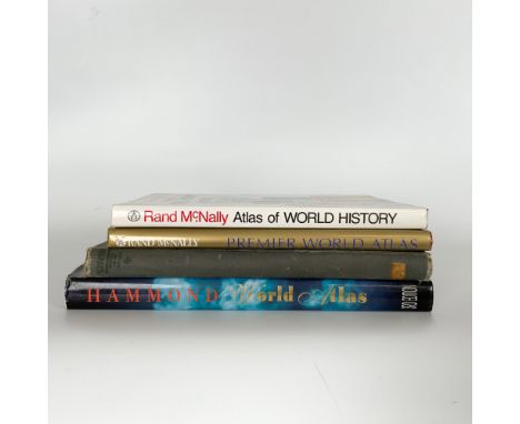 This lot features a collection of four atlases and geographical reference books, including a scarce 1918 edition of Doubleday