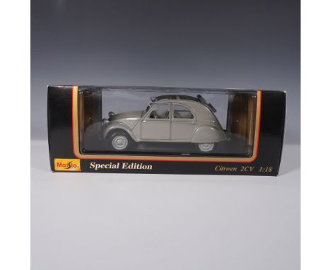 This Maisto Special Edition 1:18 scale diecast model replicates the 1952 Citroen 2CV, a classic French automobile known for i