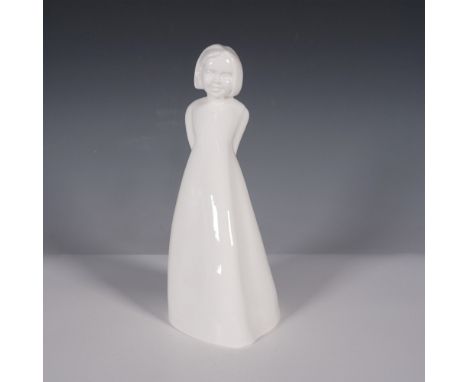 This Coalport porcelain figurine from the Moments collection, titled "My Little Angel," stands 7"H and is crafted in fine bon