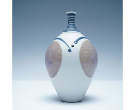 A striking studio art pottery vase, signed by the artist (may be Walsh), featuring a distinctive modernist design. The piece 