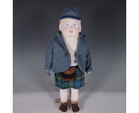 A finely crafted doll depicting the Highland Prince, dressed in traditional Scottish attire. This collectible doll features a
