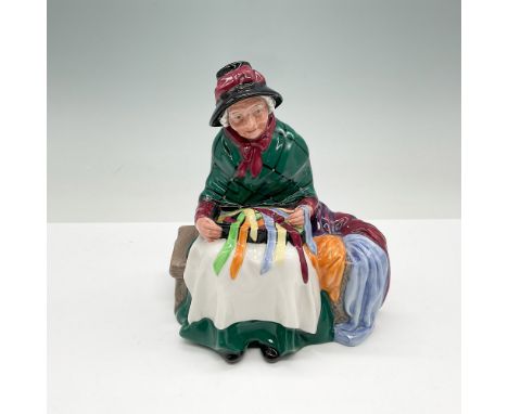Royal Doulton Silks and Ribbons figurine, model HN 2017, designed by Leslie Harradine. This charming porcelain figurine depic