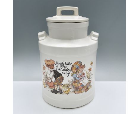 Adorable ceramic cookie jar in the shape of a milk jar with an image of a boy bathing a baby duck and a girl holding a baby. 