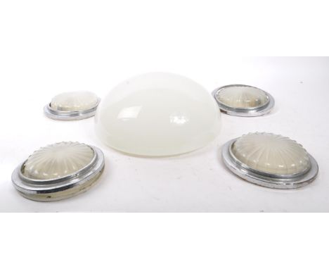 A collection of early 20th Century Art Deco lighting to include four glass circular sunburst wall lights with silver surround