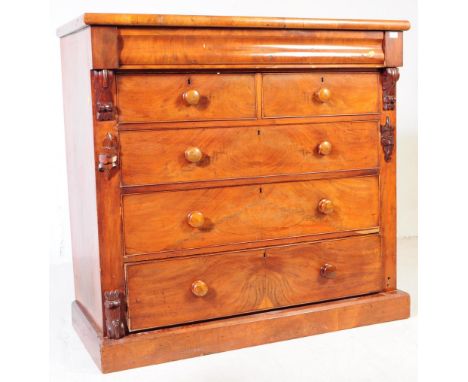 A 19th century Victorian walnut Scotch chest of drawers. Of rectangular form with a bank of two short drawers over three full