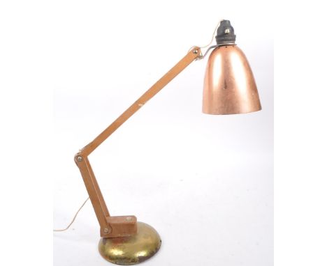 In the style of Terence Conran for Habitat - A retro mid Century Maclamp anglepoise table lamp having a painted metal circula